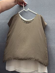 olive and white top