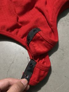 Sleeveless Red Turtleneck Bodysuit