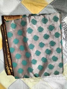 Elegant Silk Saree with Teal Motifs