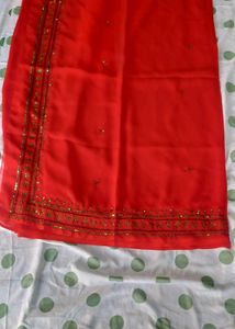 Elegant Red Saree with Gold Embellishments