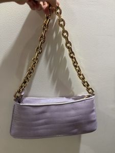 Animal print shoulder bag with chain