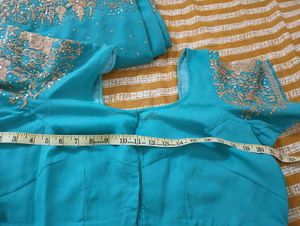 Turquoise Saree with Gold Embellishments