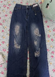 Y2k dark blue ripped denim jeans.