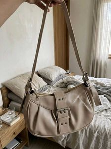 Chic Beige Hobo Bag with Buckle Detail