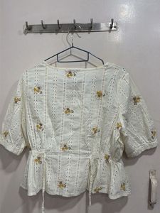 Chic White Eyelet Floral Peplum Top