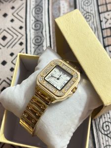 Elegant Gold Watch with Crystals