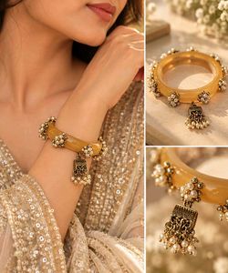 Elegant Pearl & Gold Tone Bangle Bracelet