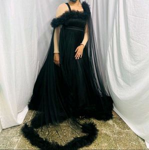Elegant Black Gown with Cape