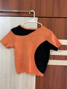 Orange &amp; Black Color Block Knit Top