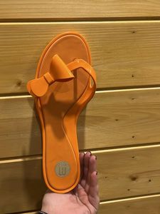 Melissa Orange Flip Flops with Bow Accent