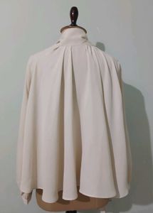 Elegant Sheer Blouse with Bow Detail