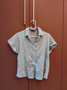 New/Unused Light blue shirt