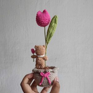 Crocheted Tulip pot with a tiny bear