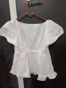 Chic White Peplum Top with Puff Sleeves