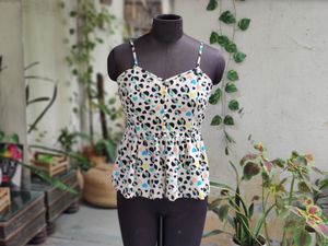 TexcoStrappy Printed Peplum Top with Back Tie-Up