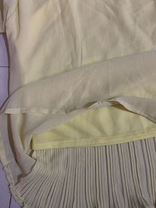 Yellow Pleated Blouse with Silver Embellishments
