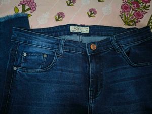 Dark Wash Denim Jeans with Frayed Hem