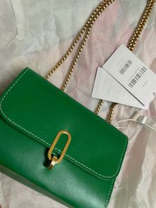 Green Crossbody Bag with Gold Chain.