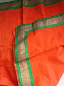 Vibrant Orange Saree with Embellished Blouse