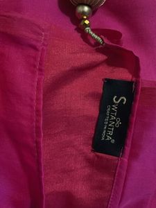 Vibrant Pink crepe Silk Saree with Tassels