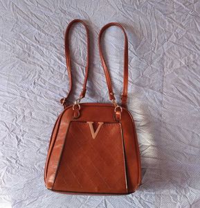 Brown leather backpack