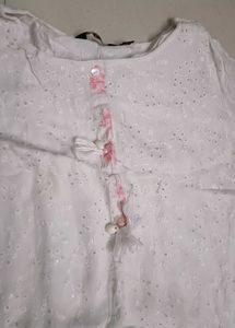Elegant White Kurti with Subtle Pink Accents