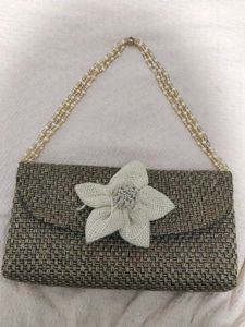 Woven Clutch with Flower Accent
