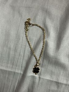Gold bracelet  with Clover charm