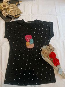 Chic Black T-Shirt with Artistic Detail