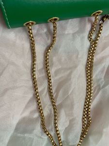 Green Crossbody Bag with Gold Chain.