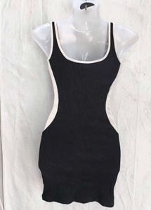 Sleek Black Bodycon Dress with White Trim