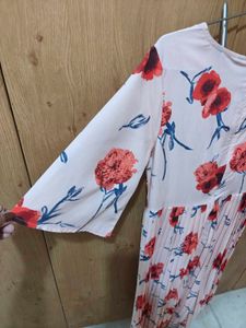 Pleated floral dress with front tie up
