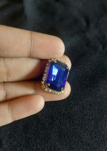 Classic Sapphire Earrings With Diamonds Around It