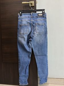 Blue Distressed Denim Jeans