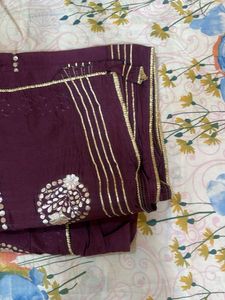 Elegant Plum Saree with Embellishments