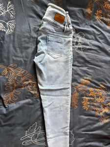 Ripped Light Wash Denim Jeans