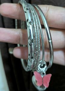 Pretty bangle set with cute charms.