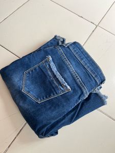 Distressed Blue Denim Jeans