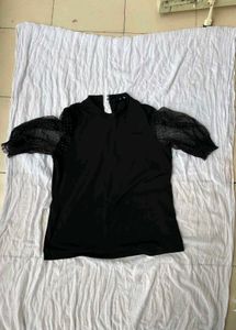 Chic Black Top with Sheer Sleeves