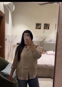 beige yellow shirt and heels