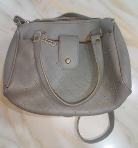 Grey sling bag