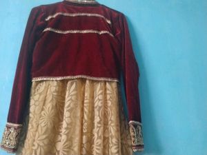 Elegant Maroon and Gold Gown