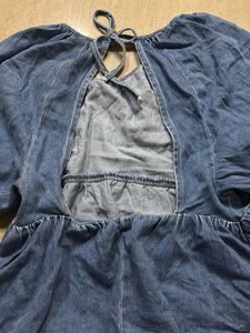 Denim Peplum Top with Tie Back