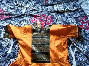 Orange Lehenga Choli with Embellishments