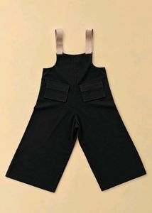 BLACK RIBBED WIDE-LEG DUNGAREES WITH BEIGE STRAPS