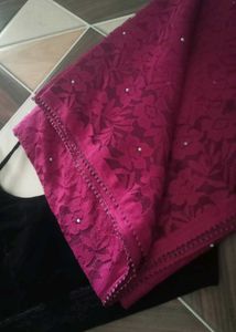 wine colour net saree with black velvet blouse