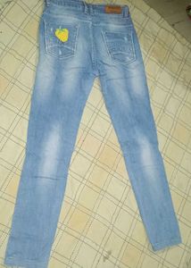 Embroidered Patch Denim Jeans