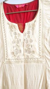 Elegant Cream Kurta with Red joint Skirt