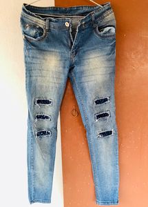 BRAND NEW FADED BLUE DISTRESSED SLIM FIT JEANS FOR WOMEN