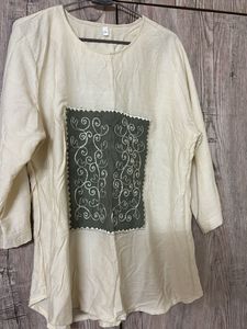 Cream top with Embroidered Patch